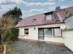 Doppelhaushälfte mit großzügigem Grundstück in Neuruppin OT Treskow - Rückansicht und Terrasse